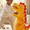 Dragon Punching Bag in play Child playing with the inflatable dragon punching bag